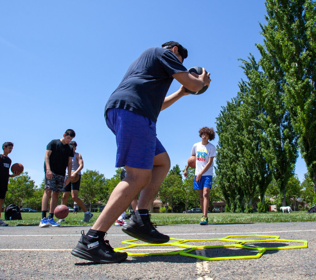 Ares players participate in our training basketball program