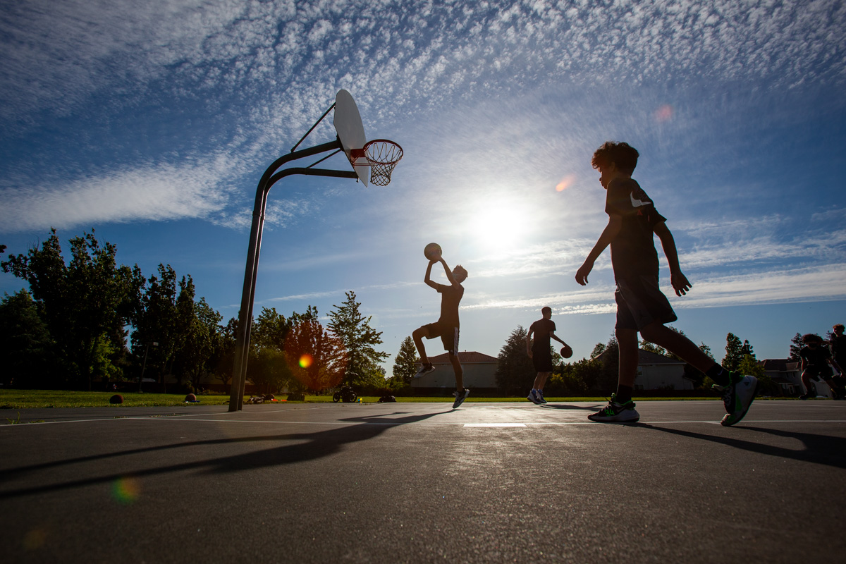 Ares basketball players practicing outside