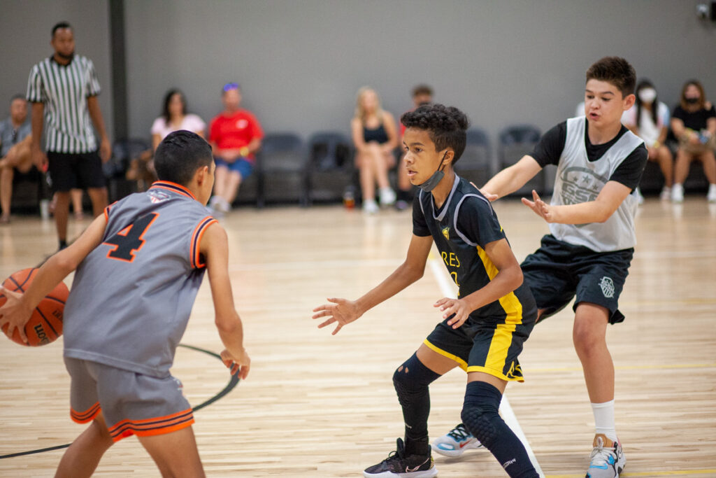 Ares basketball player during game action