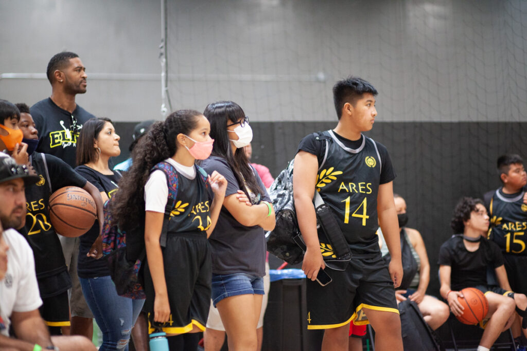 ares basketball players waiting for game time